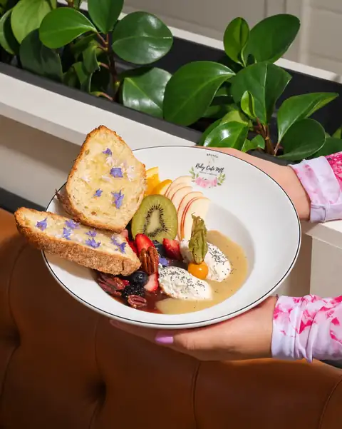 Brioche with ricotta, fresh fruit and edible flowers